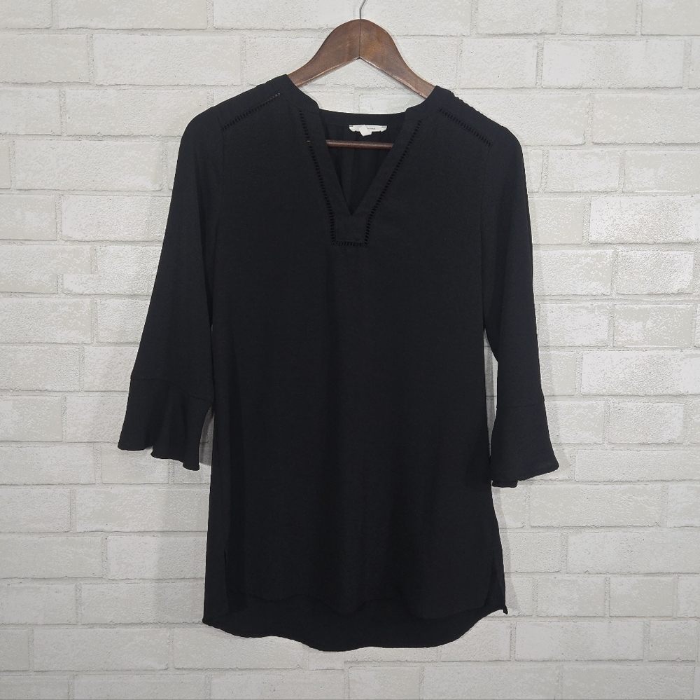 Maurice's black blouse